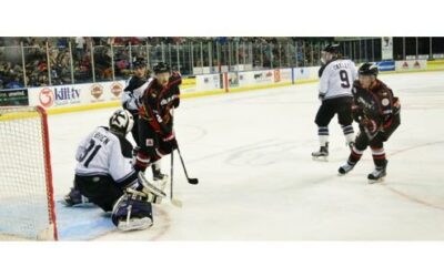 FOUR-GOAL THIRD PUSHES ICERAYS TO 5-2 WIN