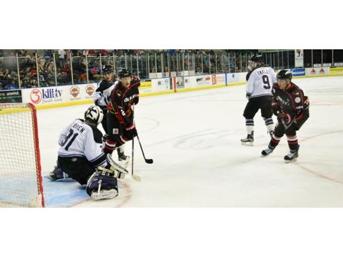 FOUR-GOAL THIRD PUSHES ICERAYS TO 5-2 WIN